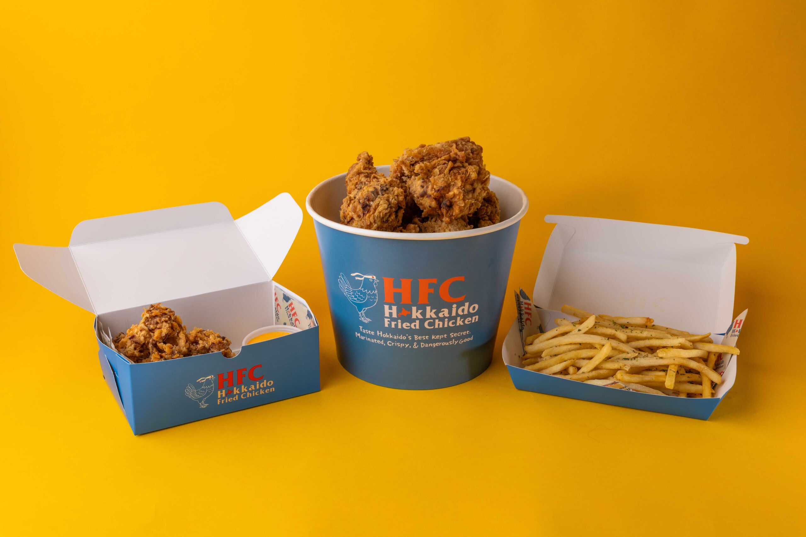 An image of a bucket of Hokkaido's authentic Japanese fried chicken.