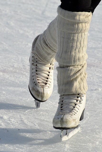 An image of feet in ice skates.