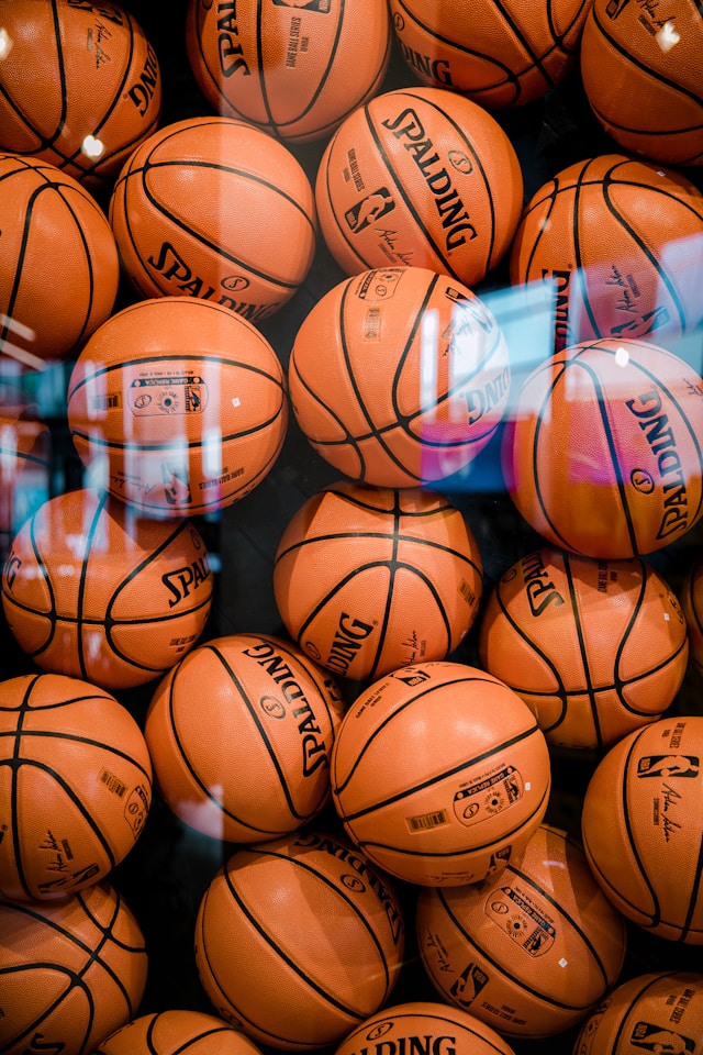 An image of tons of Spalding basketballs.
