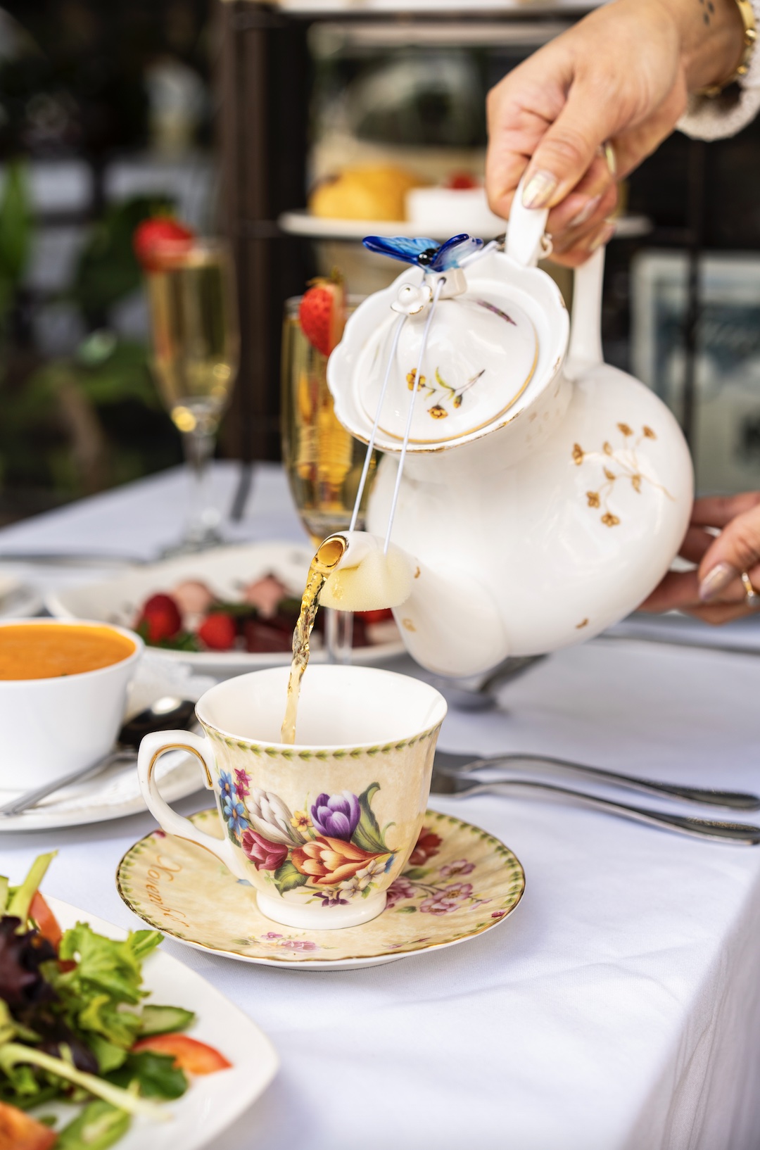 An image of someone pouring tea.
