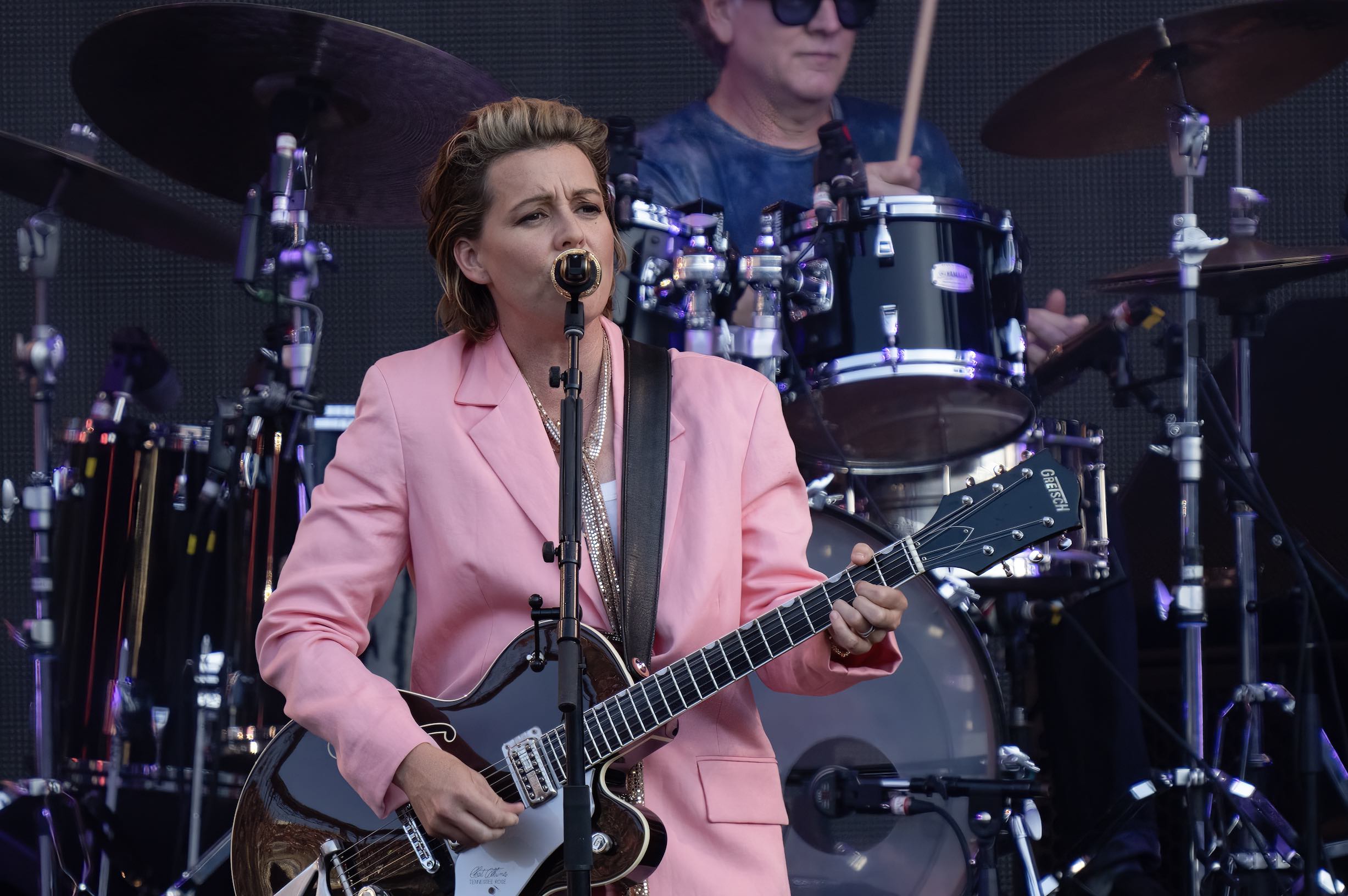 An image of Brandi Carlile playing the guitar.