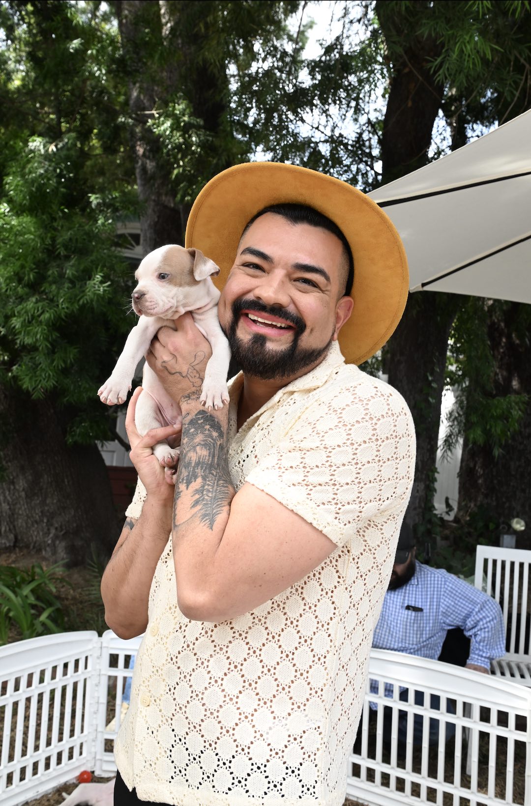 An image of a guest holding one of Wagmor Pets rescue dogs.