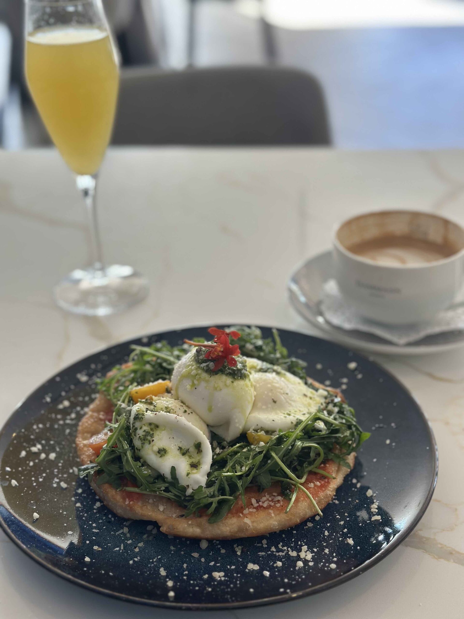 An image of the breakfast pizza from the 19Seventy at the Ovalo Restaurant & Bar