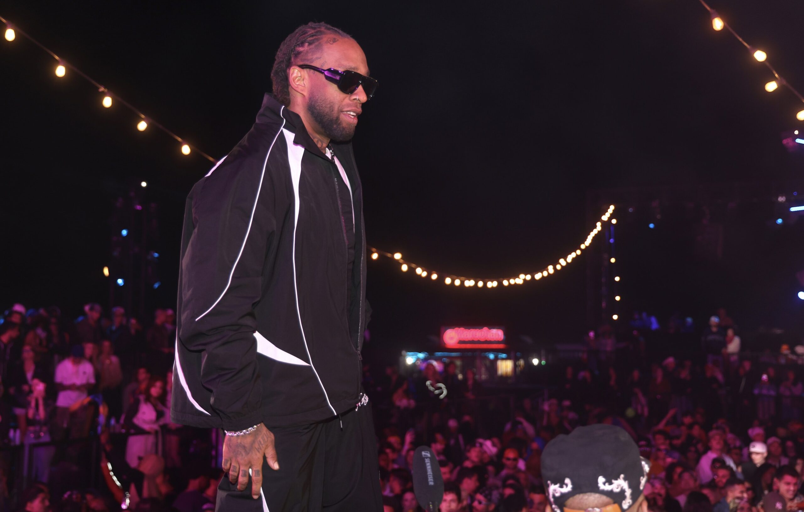 An image of Ty Dolla $ign performing at the 15th anniversary of Neon Carnival.
