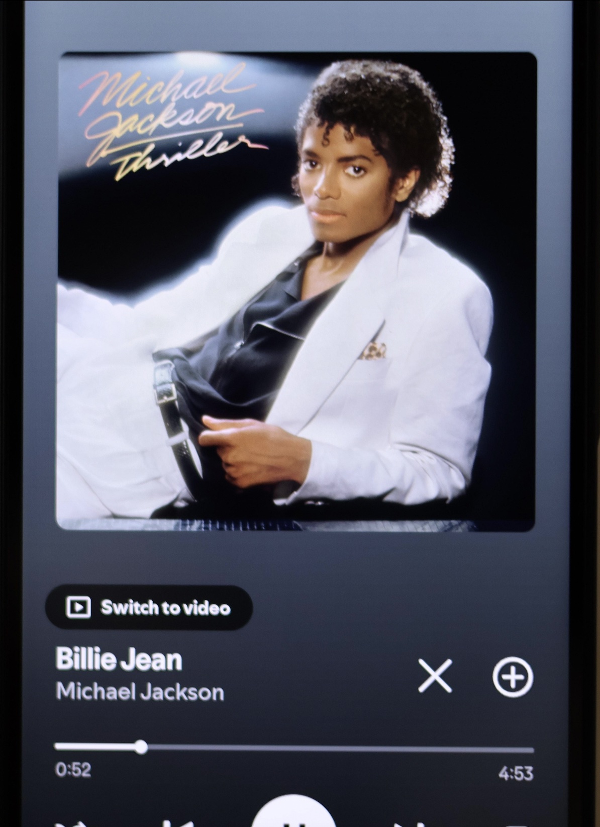 An image of Michael Jackson on a phone.