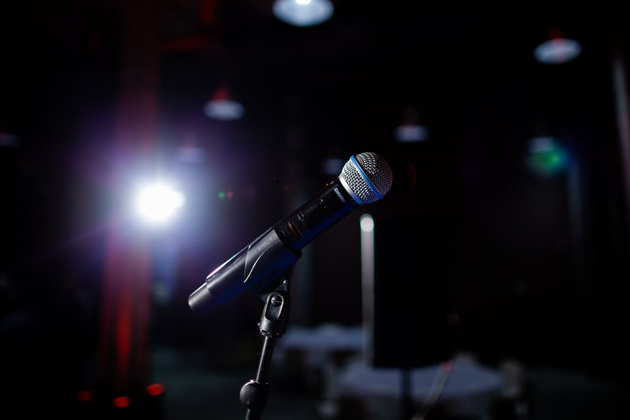 An image of a microphone on a stage.