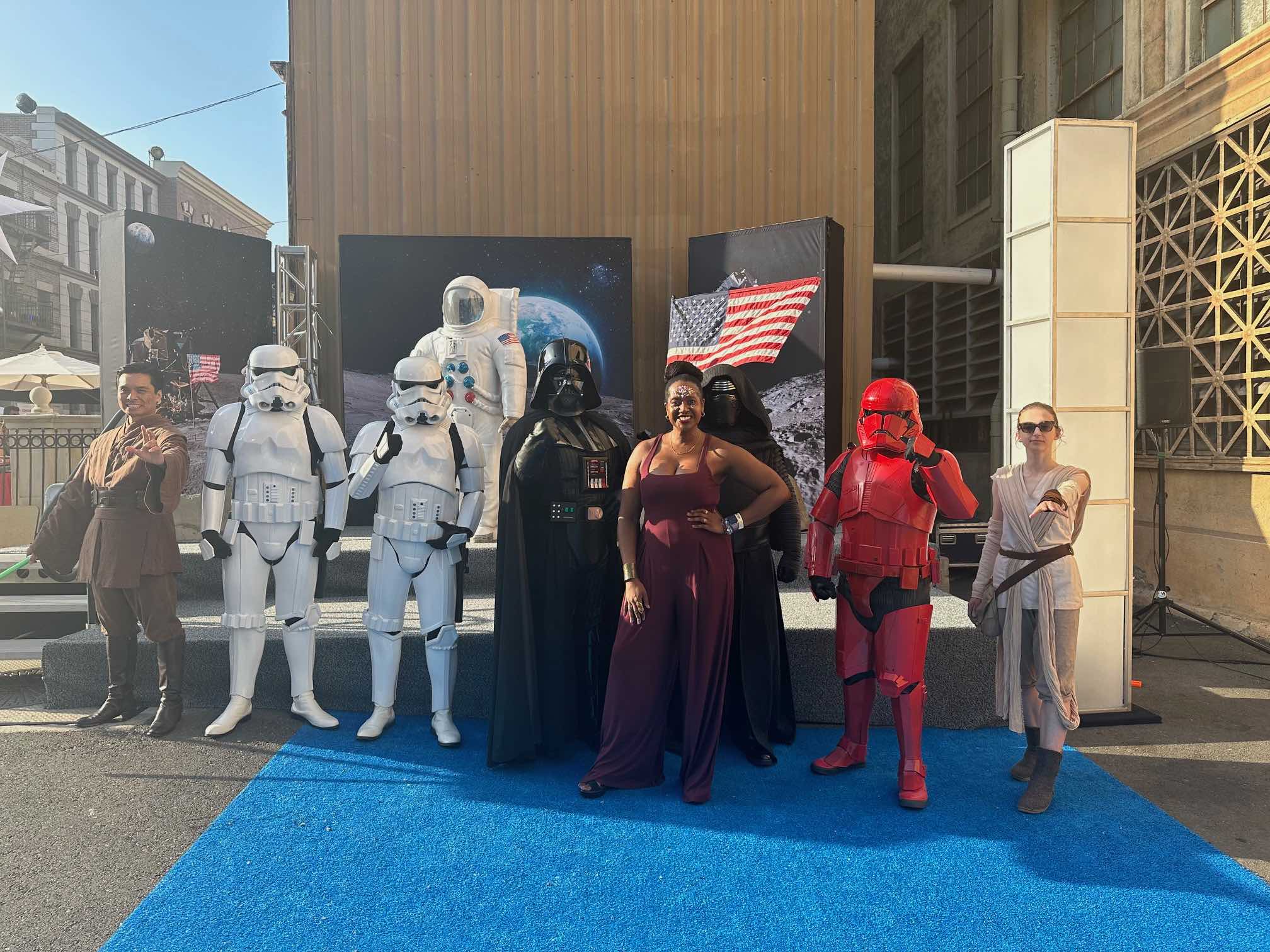 An image of lifestyle blogger Ariel Johns with Star Wars characters.