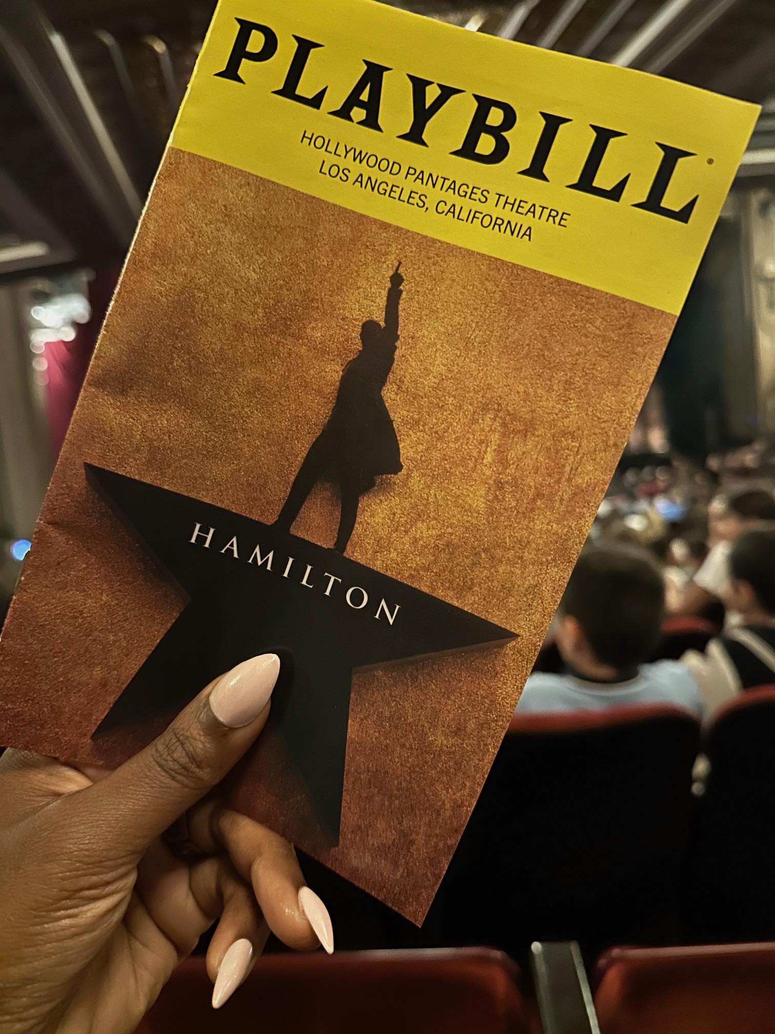 An image of a playbill for Hamilton at the Pantages.