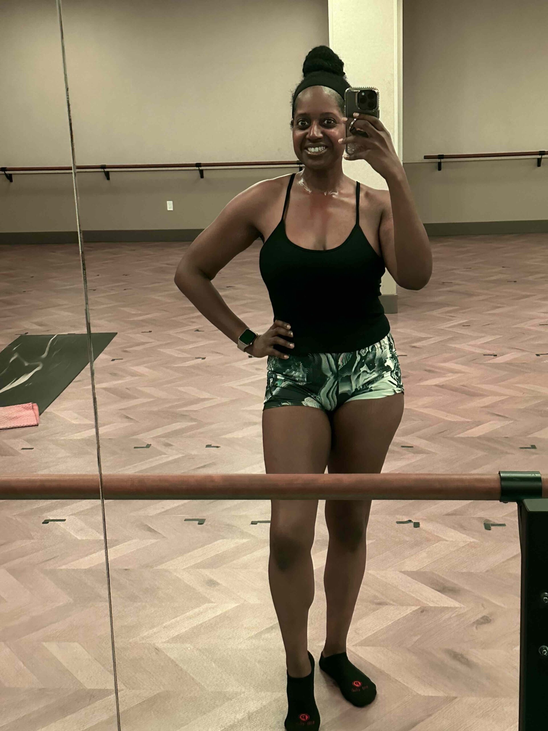 An image of lifestyle blogger Ariel Johns at a heated pilates class at Tru Fusion.