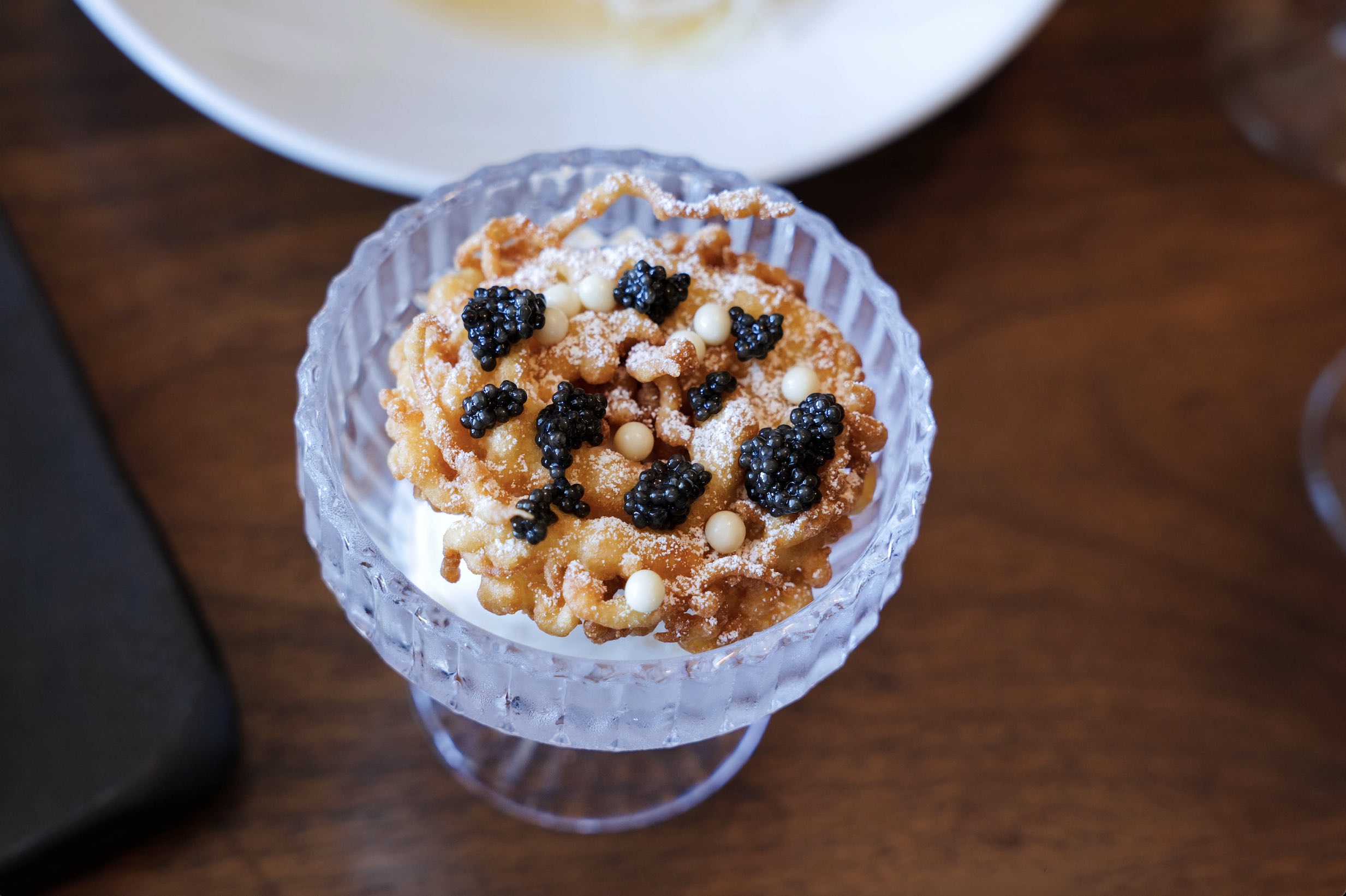 An image of the Ice Cream and Pearls dessert from Uchi.