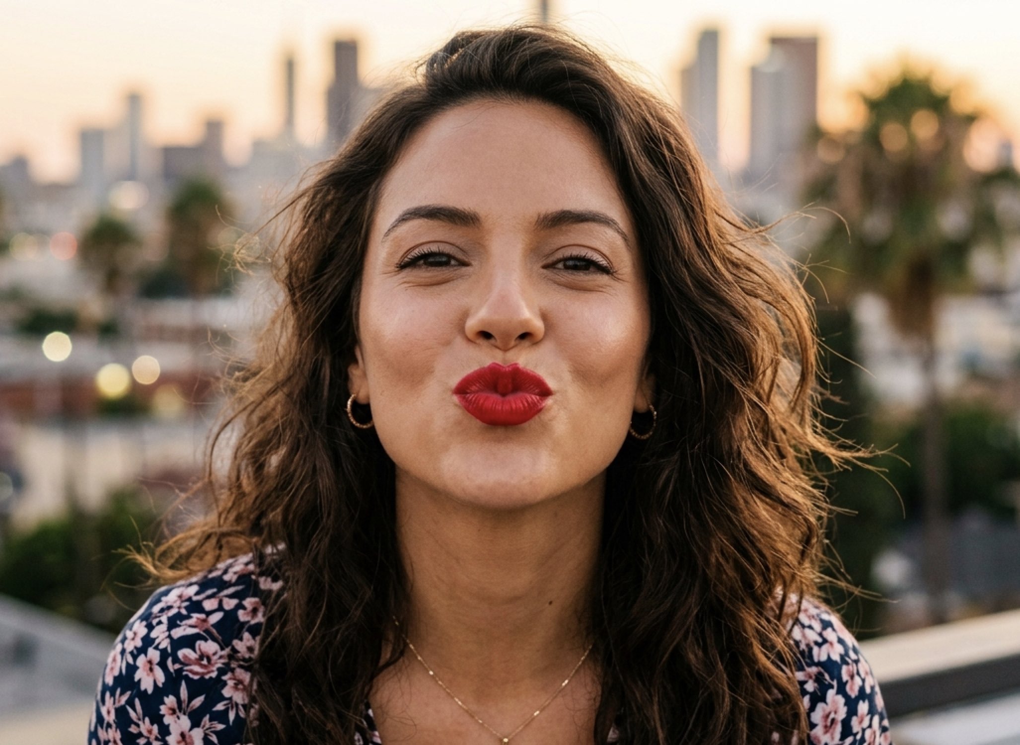 An image of a woman wearing lipstick.