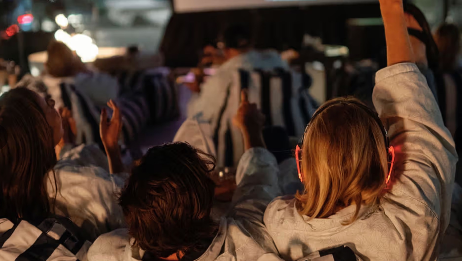 An image of people enjoying an outdoor movie.