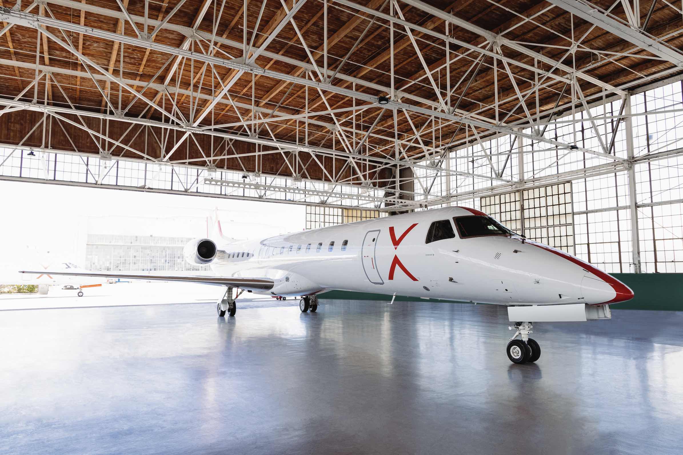 An image of a JSX jet in the hangar.
