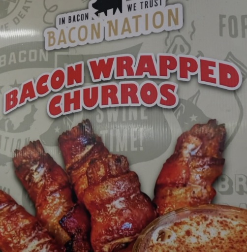 An image of the sign for Bacon Nation's Bacon-Wrapped Churros with Horchata Sauce