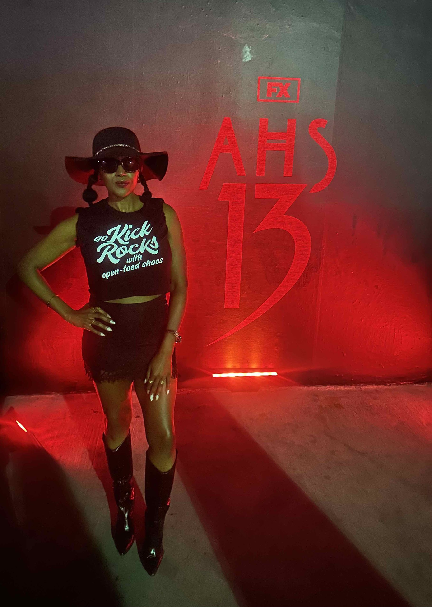 An image of lifestyle blogger Ariel Johns at the American Horror Story Season 13 interactive maze in Hollywood.