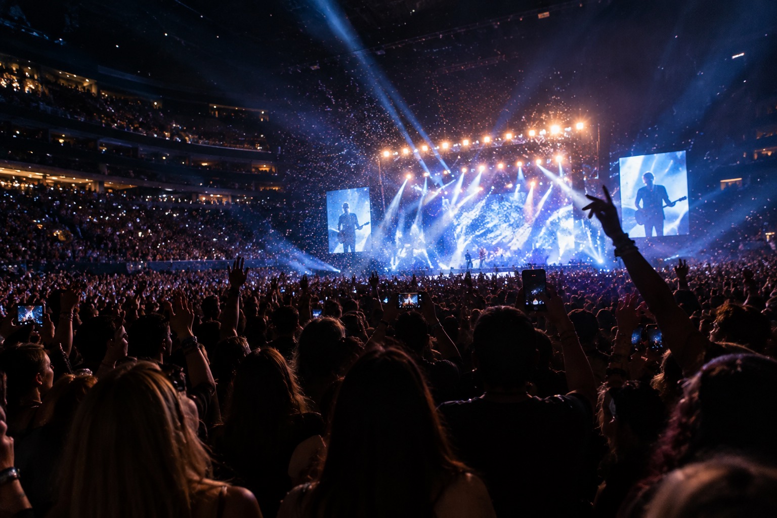 AN image of people at a concert.