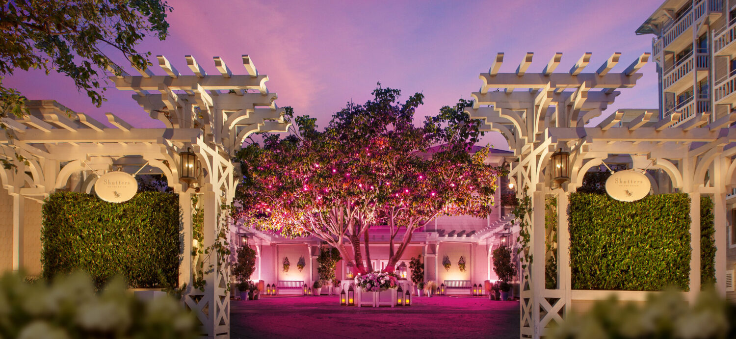 An image of the exterior of Shutters on the Beach highlighted in pink for Breast Cancer Awareness Month